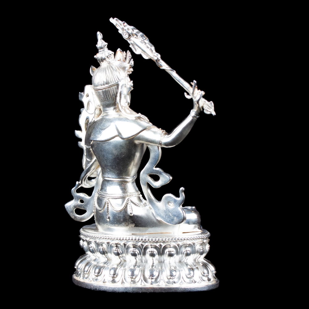 Statue of Manjushree (aka Jampel), a bodhisattva of wisdom made from Sterling Silver : height — 10.5 cm, Silver