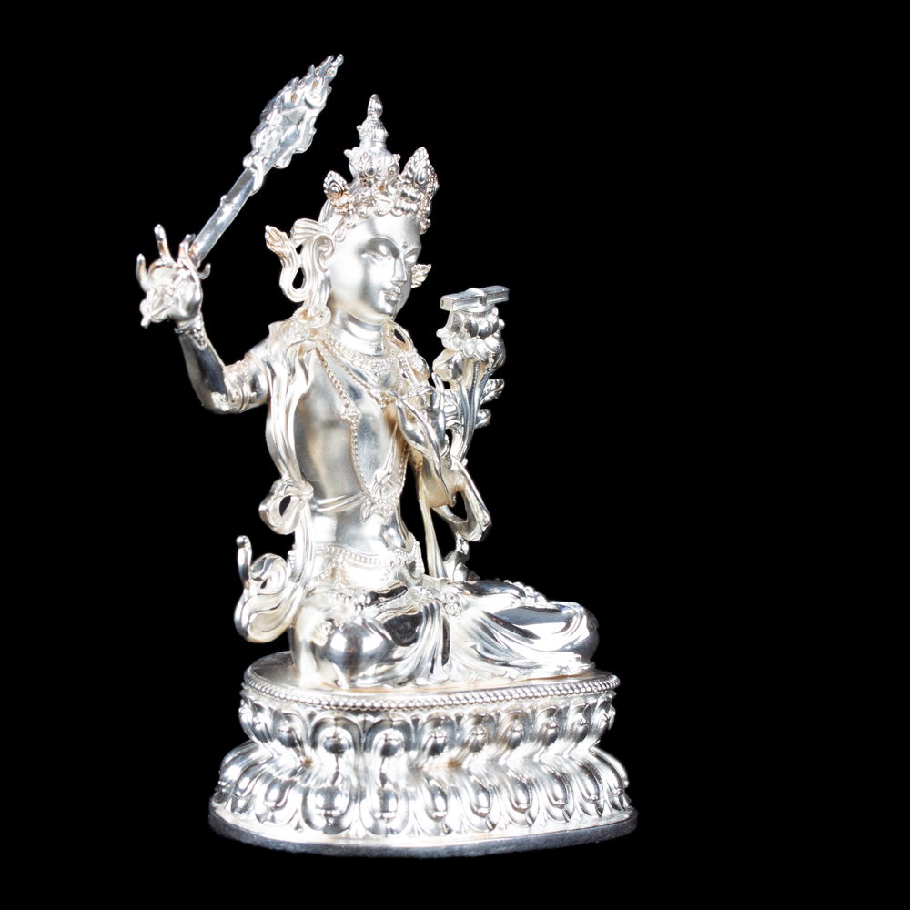Statue of Manjushree (aka Jampel), a bodhisattva of wisdom made from Sterling Silver : height — 10.5 cm, Silver