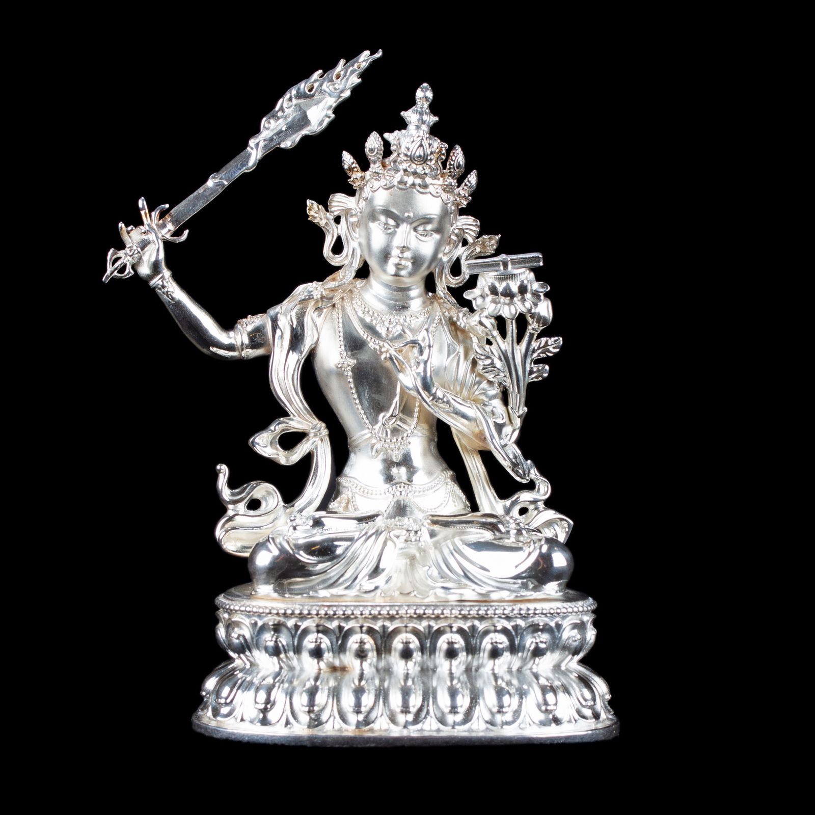 Statue of Manjushree (aka Jampel), a bodhisattva of wisdom made from Sterling Silver : height — 10.5 cm. 