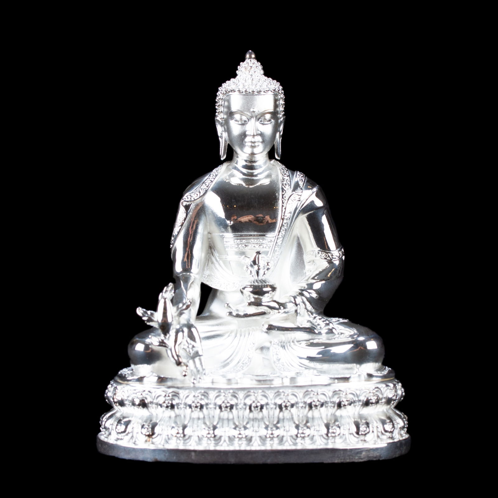 Statue of Medicine Buddha aka Menla or Bhaisajyaguru made fromSterling Silver : small perfection, height — 10 cm. 